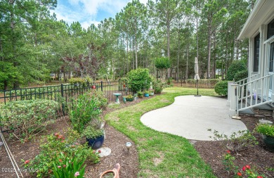 Hello Curb Appeal! A low country inspired 4BR and 3.5BA home on Ocean Ridge Plantation in North Carolina - for sale on GolfHomes.com, golf home, golf lot