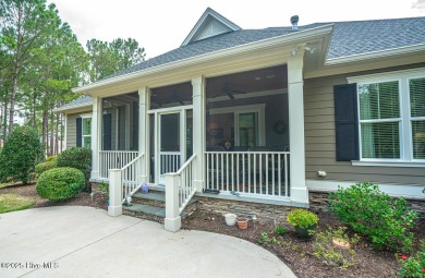 Hello Curb Appeal! A low country inspired 4BR and 3.5BA home on Ocean Ridge Plantation in North Carolina - for sale on GolfHomes.com, golf home, golf lot