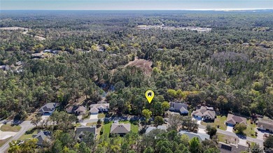Build your dream home on this beautiful vacant lot in Sugar Mill on Sugarmill Woods Golf and Country Club in Florida - for sale on GolfHomes.com, golf home, golf lot