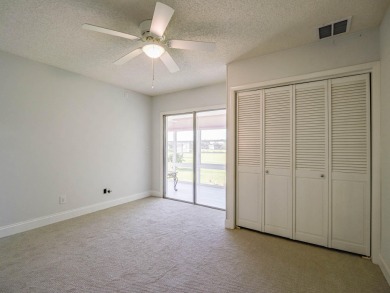 Popular ''B'' floor plan corner unit remodeled with a special on The American Golf Club in Florida - for sale on GolfHomes.com, golf home, golf lot