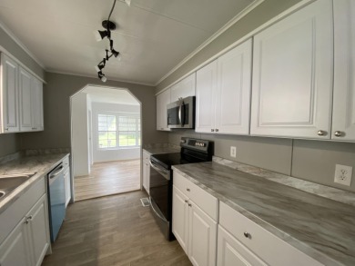 This home has been totally renovated.  New kitchen, bathrooms on Spanish Lakes Golf Village in Florida - for sale on GolfHomes.com, golf home, golf lot