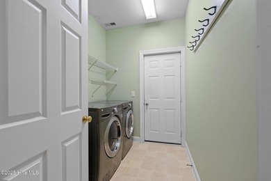 This classic all-brick home is located at the end of a private on Members Club At St. James Plantation in North Carolina - for sale on GolfHomes.com, golf home, golf lot