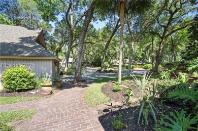 Stunning home providing wonderful privacy in the highly on Sea Pines Country Club in South Carolina - for sale on GolfHomes.com, golf home, golf lot