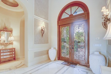 Discover this beautiful home in the Tesoro golf community on The Tesoro Golf Course and Club in Florida - for sale on GolfHomes.com, golf home, golf lot