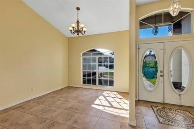 Opportunity to own this 4-bedroom, 3 bath pool home in on Wedgefield Golf Club in Florida - for sale on GolfHomes.com, golf home, golf lot