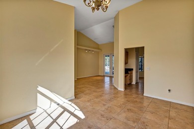 Opportunity to own this 4-bedroom, 3 bath pool home in on Wedgefield Golf Club in Florida - for sale on GolfHomes.com, golf home, golf lot