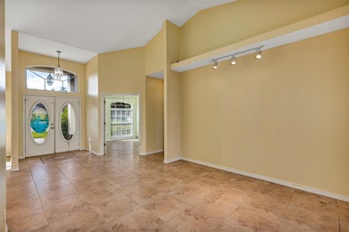 Opportunity to own this 4-bedroom, 3 bath pool home in on Wedgefield Golf Club in Florida - for sale on GolfHomes.com, golf home, golf lot