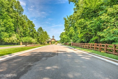 BUILD YOUR NEW HOME ON THIS WOODED LOT IN TENNESSEE NATIONAL on Tennessee National Golf Club in Tennessee - for sale on GolfHomes.com, golf home, golf lot