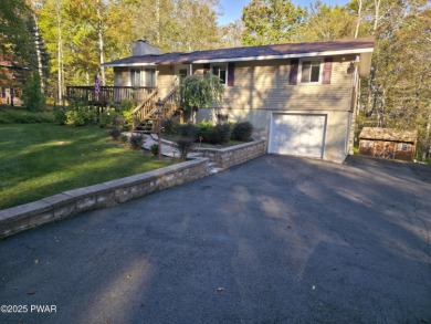 BEAUTIFUL TANGLWOOD LAKES RAISED RANCH AT LAKE WALLENPAUPACK! on Paupack Hills Golf and Country Club in Pennsylvania - for sale on GolfHomes.com, golf home, golf lot