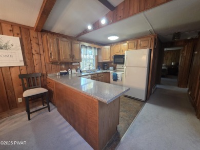 BEAUTIFUL TANGLWOOD LAKES RAISED RANCH AT LAKE WALLENPAUPACK! on Paupack Hills Golf and Country Club in Pennsylvania - for sale on GolfHomes.com, golf home, golf lot