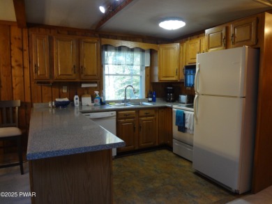BEAUTIFUL TANGLWOOD LAKES RAISED RANCH AT LAKE WALLENPAUPACK! on Paupack Hills Golf and Country Club in Pennsylvania - for sale on GolfHomes.com, golf home, golf lot
