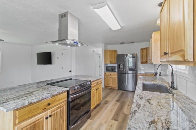 Beautifully remodeled 3-bed, 1-bath country home on  1/2  acre on Twin Falls Municipal Golf Course in Idaho - for sale on GolfHomes.com, golf home, golf lot