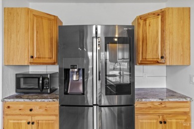 Beautifully remodeled 3-bed, 1-bath country home on  1/2  acre on Twin Falls Municipal Golf Course in Idaho - for sale on GolfHomes.com, golf home, golf lot