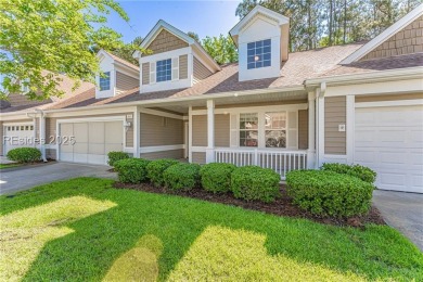 This two bedroom, two bath Hawthorne model has a great golf view on Okatie Creek Golf Club in South Carolina - for sale on GolfHomes.com, golf home, golf lot