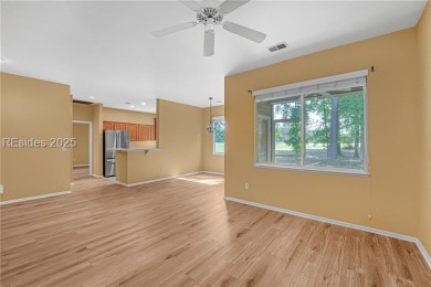 This two bedroom, two bath Hawthorne model has a great golf view on Okatie Creek Golf Club in South Carolina - for sale on GolfHomes.com, golf home, golf lot