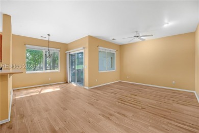This two bedroom, two bath Hawthorne model has a great golf view on Okatie Creek Golf Club in South Carolina - for sale on GolfHomes.com, golf home, golf lot