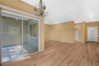 This two bedroom, two bath Hawthorne model has a great golf view on Okatie Creek Golf Club in South Carolina - for sale on GolfHomes.com, golf home, golf lot