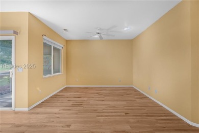 This two bedroom, two bath Hawthorne model has a great golf view on Okatie Creek Golf Club in South Carolina - for sale on GolfHomes.com, golf home, golf lot