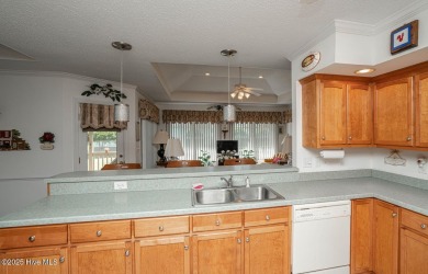 Adorable home maintained for years by the original owner on Meadowlands Golf Club in North Carolina - for sale on GolfHomes.com, golf home, golf lot