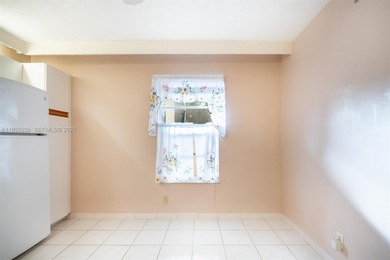 Welcome to this spacious corner 2-bedroom, 2-bath residence on Hollybrook Golf and Tennis Club  in Florida - for sale on GolfHomes.com, golf home, golf lot