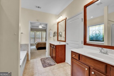 Discover the perfect blend of comfort, style, and active living on Canongate Golf At Sun City Peachtree in Georgia - for sale on GolfHomes.com, golf home, golf lot