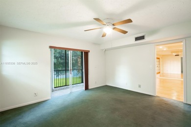 Welcome to this spacious corner 2-bedroom, 2-bath residence on Hollybrook Golf and Tennis Club  in Florida - for sale on GolfHomes.com, golf home, golf lot