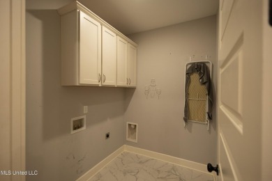 Welcome to this beautifully maintained 4-bedroom, 3-bathroom on Cherokee Valley Golf Course in Mississippi - for sale on GolfHomes.com, golf home, golf lot