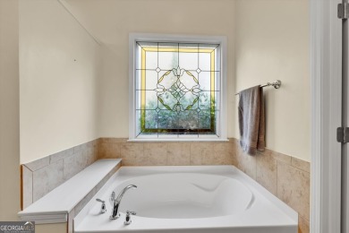 Discover the perfect blend of comfort, style, and active living on Canongate Golf At Sun City Peachtree in Georgia - for sale on GolfHomes.com, golf home, golf lot
