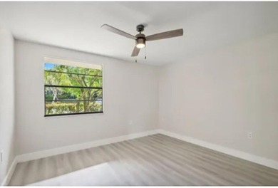 Gorgeous updated large 2 BR/ 2Ba first floor unit with beautiful on Bear Lakes Country Club in Florida - for sale on GolfHomes.com, golf home, golf lot