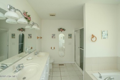 Adorable home maintained for years by the original owner on Meadowlands Golf Club in North Carolina - for sale on GolfHomes.com, golf home, golf lot