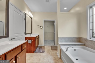 Discover the perfect blend of comfort, style, and active living on Canongate Golf At Sun City Peachtree in Georgia - for sale on GolfHomes.com, golf home, golf lot