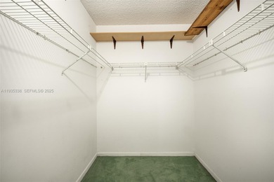 Welcome to this spacious corner 2-bedroom, 2-bath residence on Hollybrook Golf and Tennis Club  in Florida - for sale on GolfHomes.com, golf home, golf lot