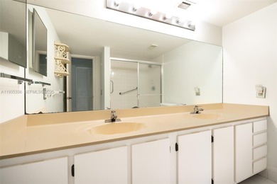 Welcome to this spacious corner 2-bedroom, 2-bath residence on Hollybrook Golf and Tennis Club  in Florida - for sale on GolfHomes.com, golf home, golf lot