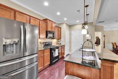 Discover the perfect blend of comfort, style, and active living on Canongate Golf At Sun City Peachtree in Georgia - for sale on GolfHomes.com, golf home, golf lot