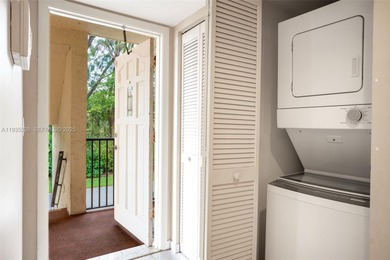 Welcome to this spacious corner 2-bedroom, 2-bath residence on Hollybrook Golf and Tennis Club  in Florida - for sale on GolfHomes.com, golf home, golf lot