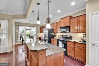 Discover the perfect blend of comfort, style, and active living on Canongate Golf At Sun City Peachtree in Georgia - for sale on GolfHomes.com, golf home, golf lot
