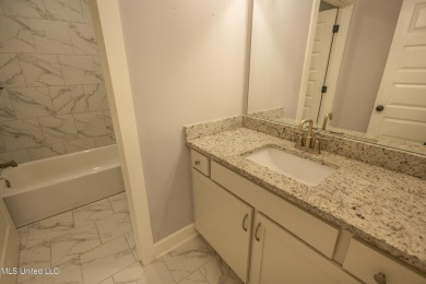 Welcome to this beautifully maintained 4-bedroom, 3-bathroom on Cherokee Valley Golf Course in Mississippi - for sale on GolfHomes.com, golf home, golf lot