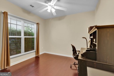 Discover the perfect blend of comfort, style, and active living on Canongate Golf At Sun City Peachtree in Georgia - for sale on GolfHomes.com, golf home, golf lot