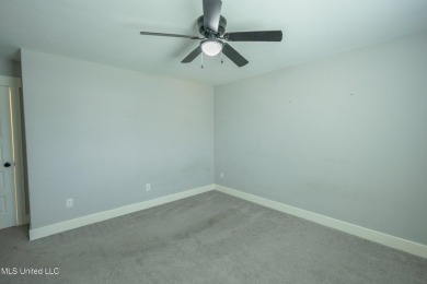 Welcome to this beautifully maintained 4-bedroom, 3-bathroom on Cherokee Valley Golf Course in Mississippi - for sale on GolfHomes.com, golf home, golf lot