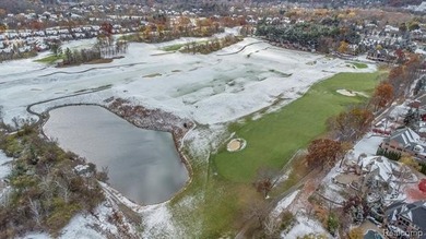 Perched gracefully above the landscape, this Oakhurst residence on Oakhurst Golf and Country Club in Michigan - for sale on GolfHomes.com, golf home, golf lot