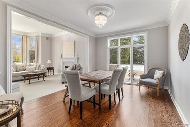 Perched gracefully above the landscape, this Oakhurst residence on Oakhurst Golf and Country Club in Michigan - for sale on GolfHomes.com, golf home, golf lot