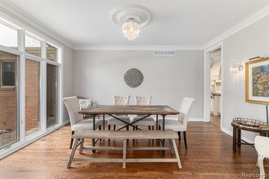 Perched gracefully above the landscape, this Oakhurst residence on Oakhurst Golf and Country Club in Michigan - for sale on GolfHomes.com, golf home, golf lot