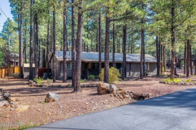 REDUCED PRICE FOR A LUCKY NEW OWNERS!! Nestled among towering on Pinetop Lakes Golf and Country Club in Arizona - for sale on GolfHomes.com, golf home, golf lot