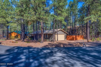 REDUCED PRICE FOR A LUCKY NEW OWNERS!! Nestled among towering on Pinetop Lakes Golf and Country Club in Arizona - for sale on GolfHomes.com, golf home, golf lot