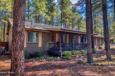 REDUCED PRICE FOR A LUCKY NEW OWNERS!! Nestled among towering on Pinetop Lakes Golf and Country Club in Arizona - for sale on GolfHomes.com, golf home, golf lot