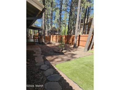 REDUCED PRICE FOR A LUCKY NEW OWNERS!! Nestled among towering on Pinetop Lakes Golf and Country Club in Arizona - for sale on GolfHomes.com, golf home, golf lot