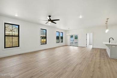 Welcome to 4402 Par Ln, a beautifully designed new construction on Twin Hills Golf and Country Club in Missouri - for sale on GolfHomes.com, golf home, golf lot