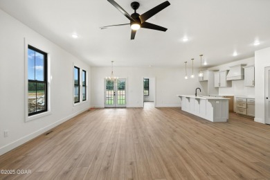 Welcome to 4402 Par Ln, a beautifully designed new construction on Twin Hills Golf and Country Club in Missouri - for sale on GolfHomes.com, golf home, golf lot