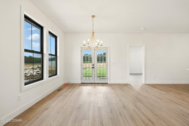 Welcome to 4402 Par Ln, a beautifully designed new construction on Twin Hills Golf and Country Club in Missouri - for sale on GolfHomes.com, golf home, golf lot
