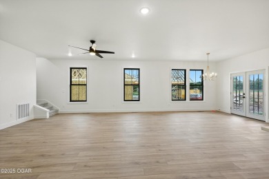 Welcome to 4402 Par Ln, a beautifully designed new construction on Twin Hills Golf and Country Club in Missouri - for sale on GolfHomes.com, golf home, golf lot
